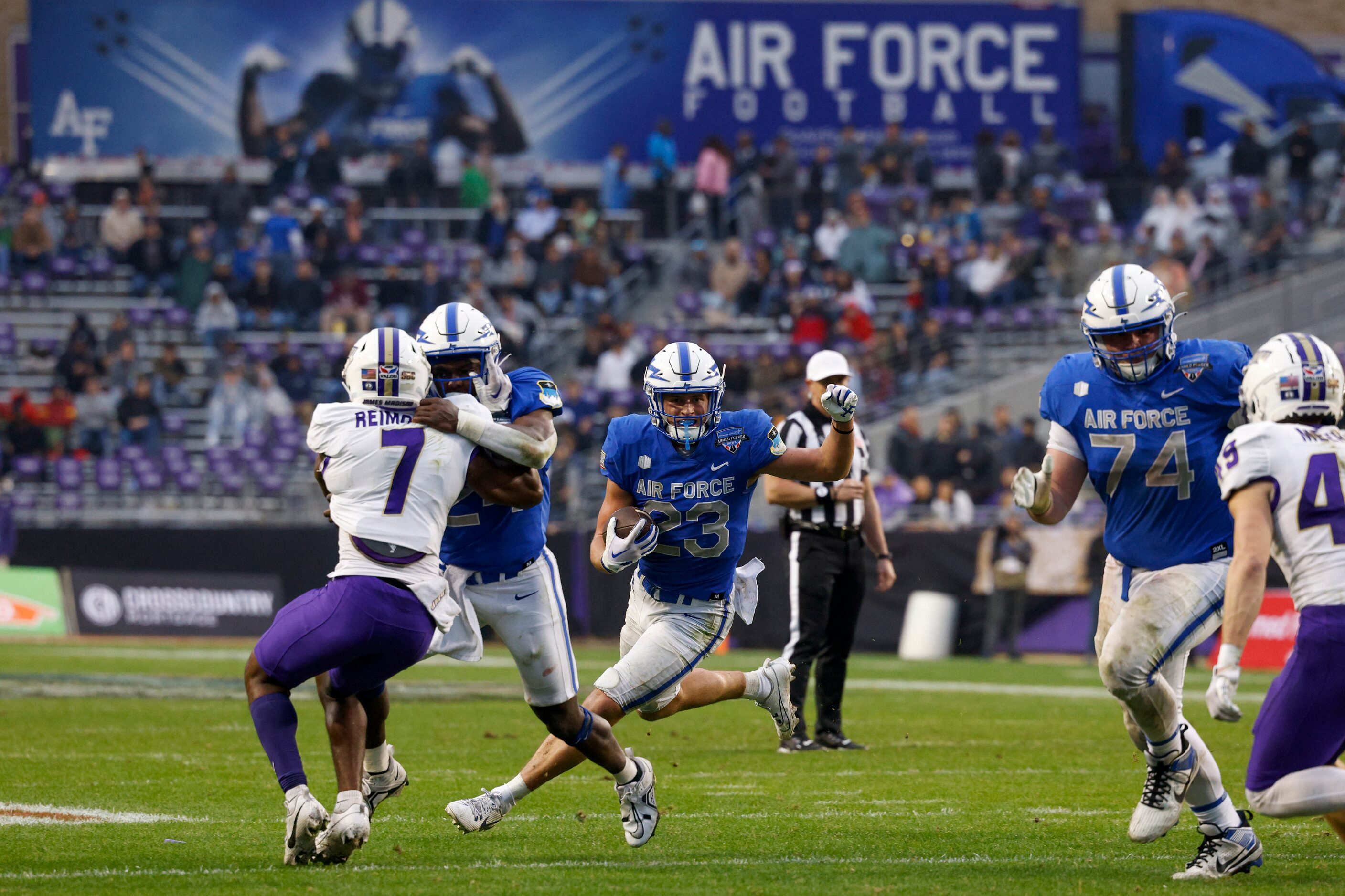 Air Force Falcons wide receiver Dane Kinamon (23) runs upfield during the second half of the...