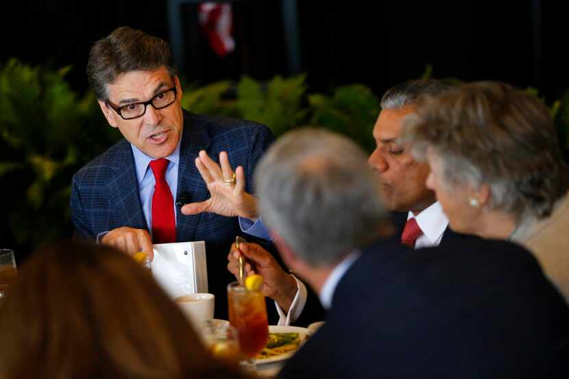  Former Gov. Rick Perry visits with World Affairs Council of Dallas/Fort Worth members...