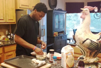 Johnson helped prepare a meal in the the Stephensons' kitchen in 2014. (Stephenson family)