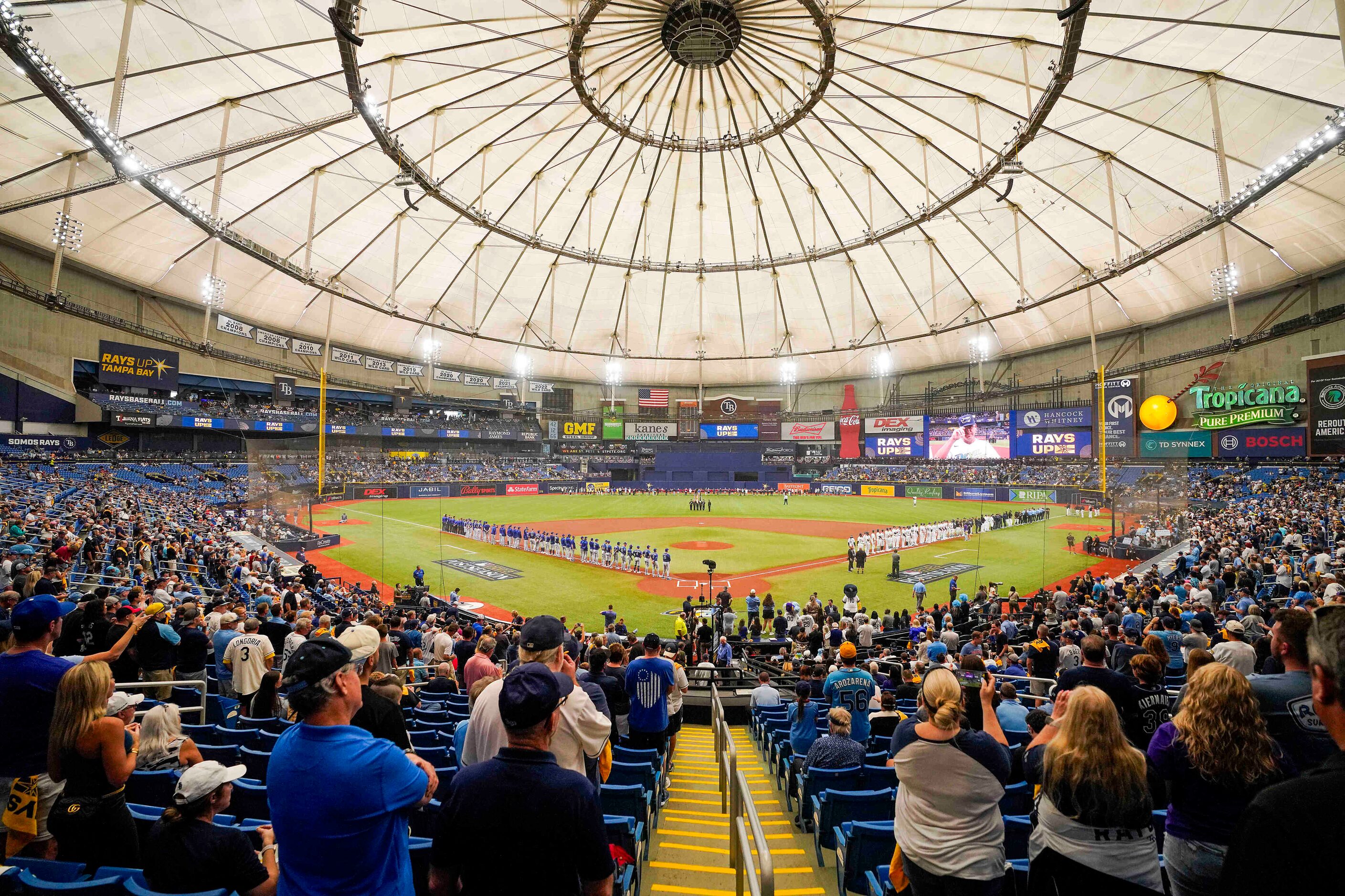 Fans cheer as the teams are introduced before an  American League Wild Card playoff baseball...