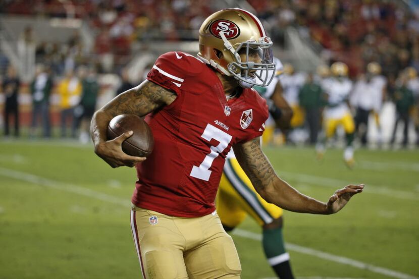 Colin Kaepernick makes a move during a preseason game against the Green Bay Packers. (2016...
