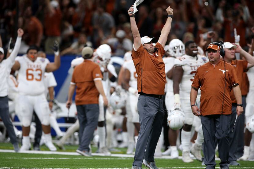 Texas head coach Tom Herman celebrates a touchdown in the second half of the Sugar Bowl NCAA...