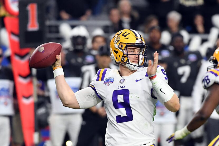 GLENDALE, ARIZONA - JANUARY 01: Quarterback Joe Burrow #9 of the LSU Tigers throws a pass...