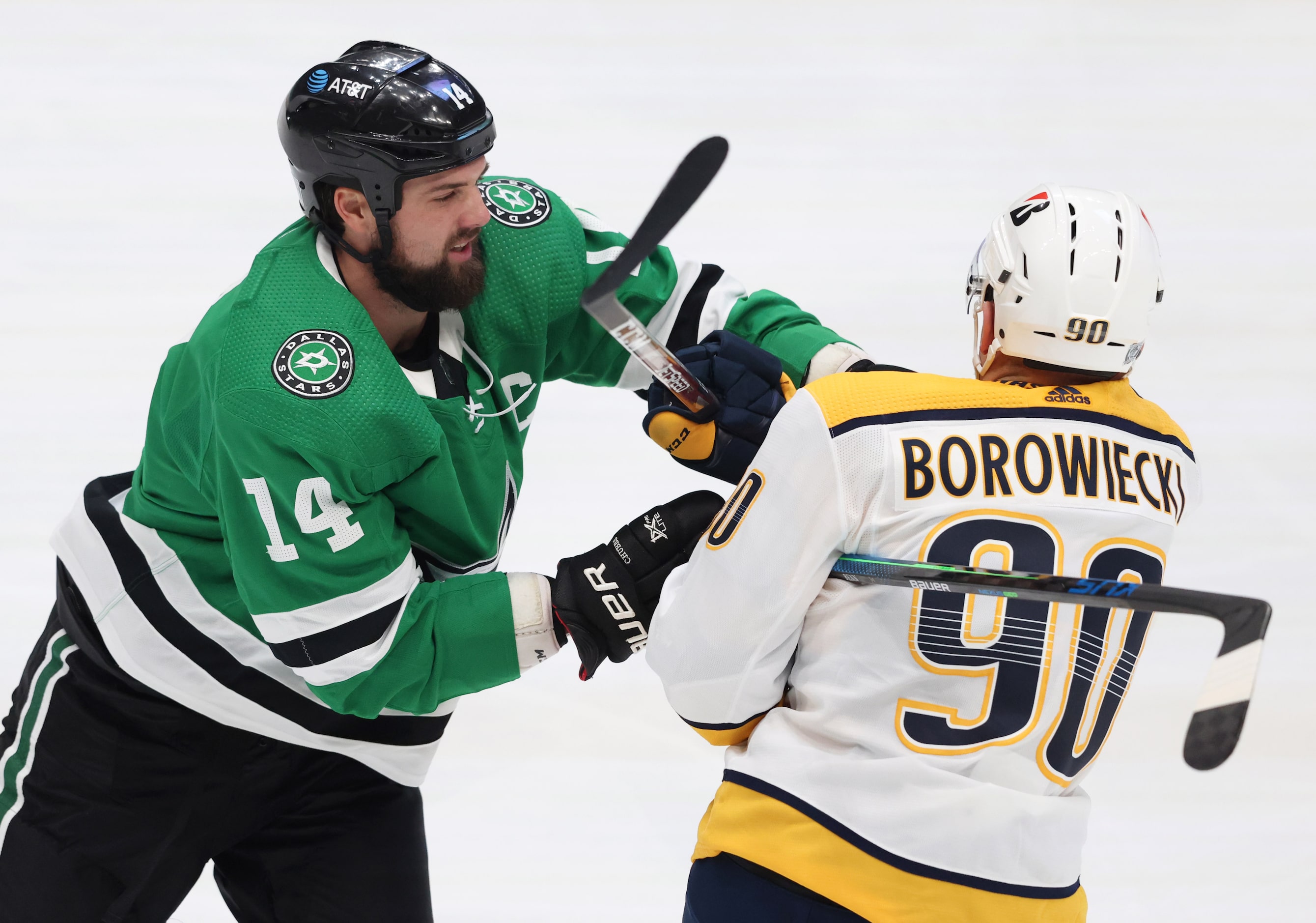 Dallas Stars left wing Jamie Benn (14) and Nashville Predators defenseman Mark Borowiecki...