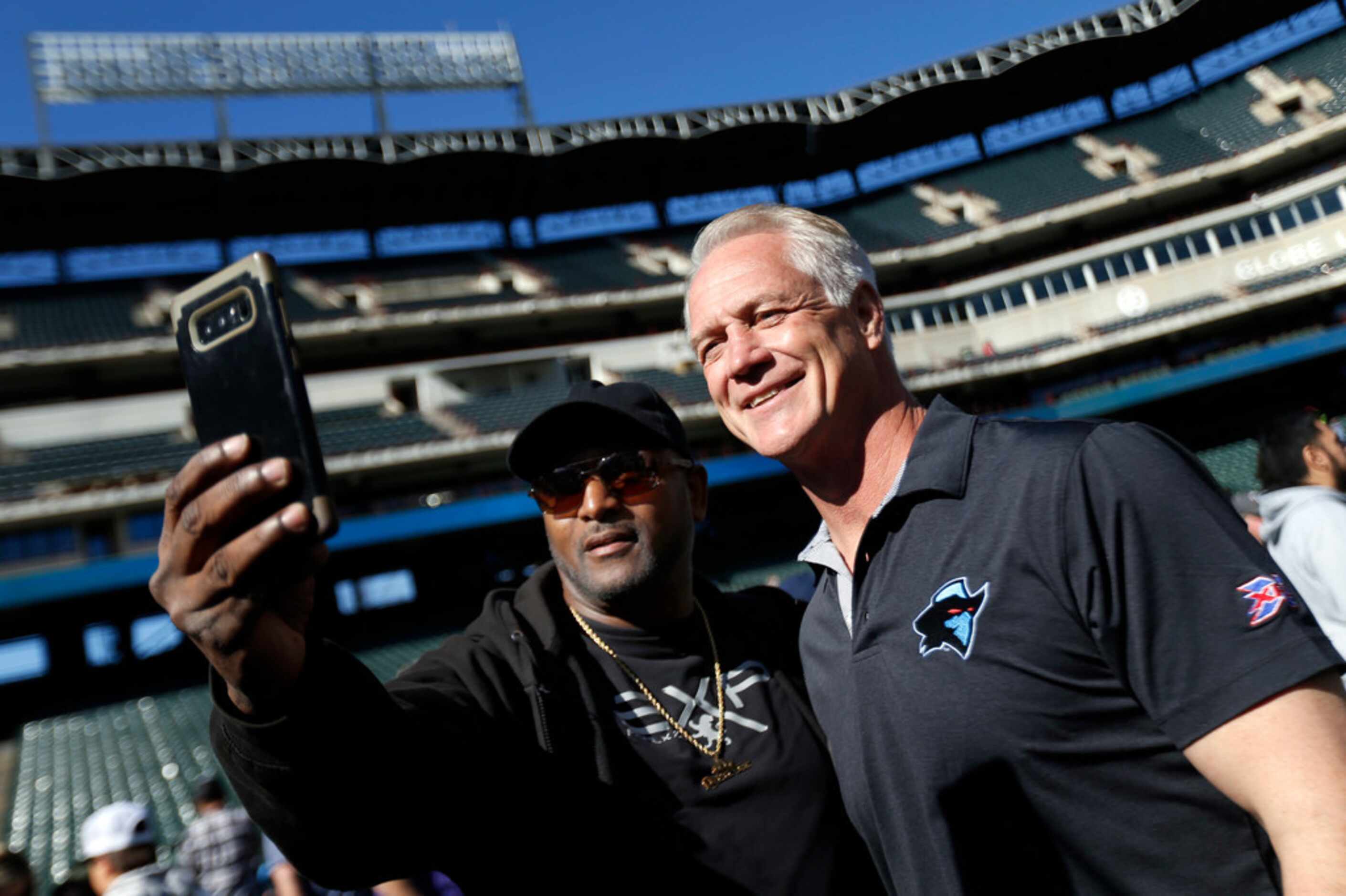 Dallas Renegades fan Kent Williams of Dallas  takes a selfie with director of player...
