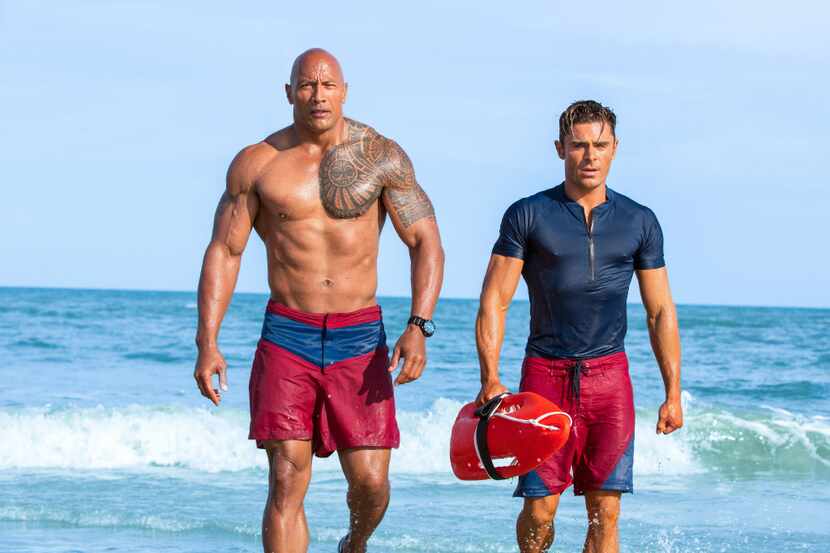 (L-R) Dwayne Johnson as Mitch Buchannon and Zac Efron as Matt Brody in BAYWATCH by Paramount...