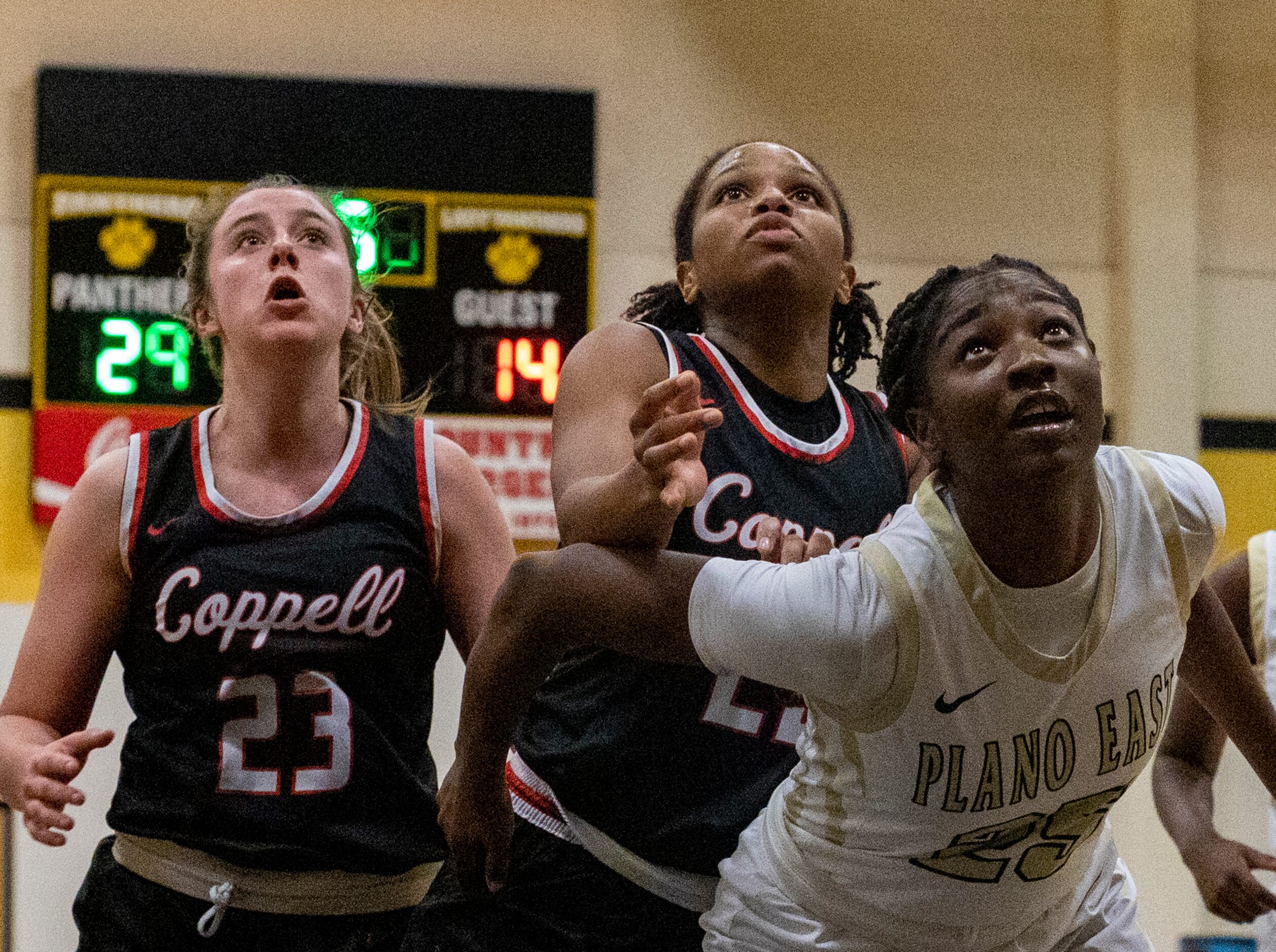 Players watch as the ball is in the air during the second half of the game in Plano on...