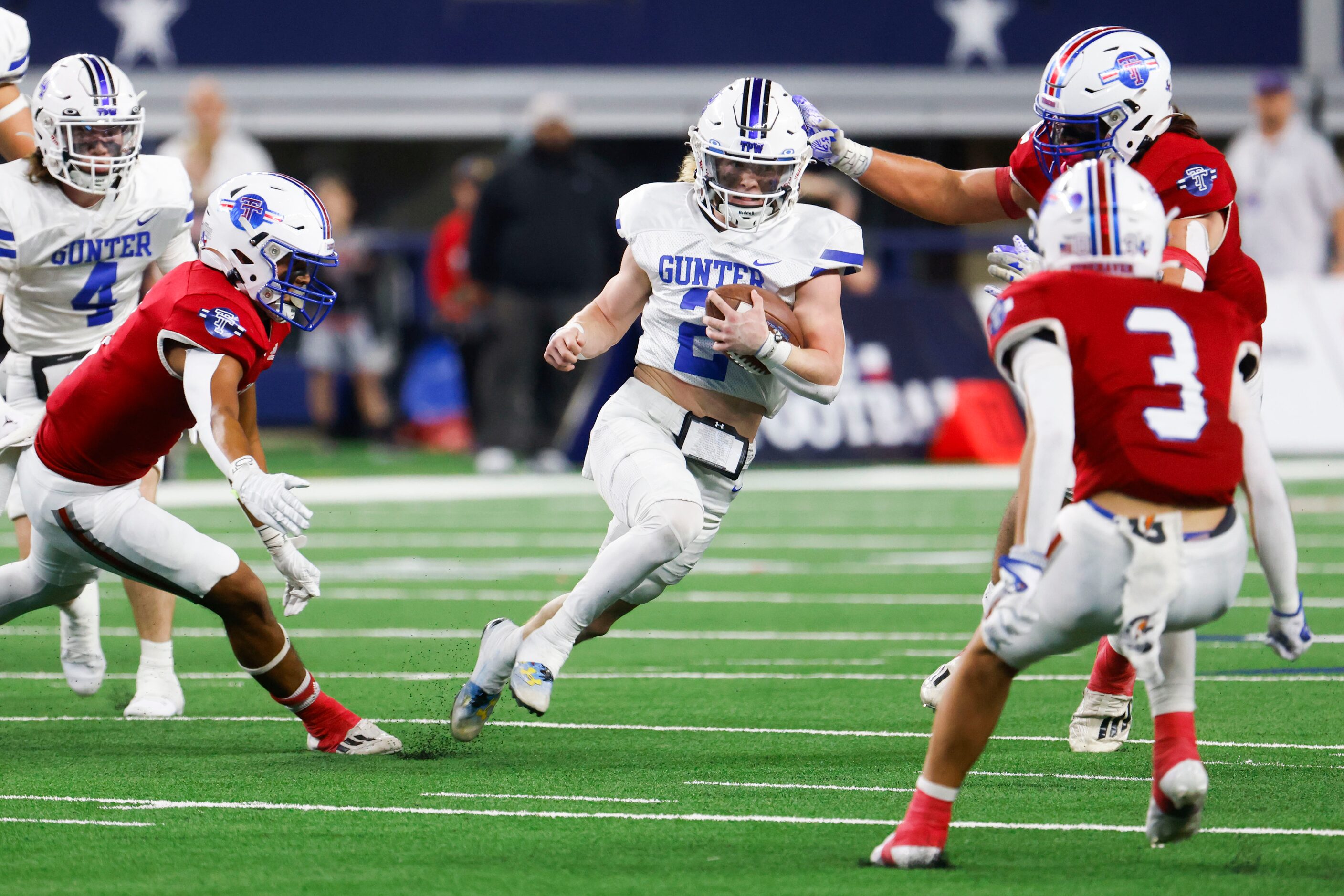 Gunter High’s QB Walker Overman (2) runs with the ball against El Maton Tidehaven during the...