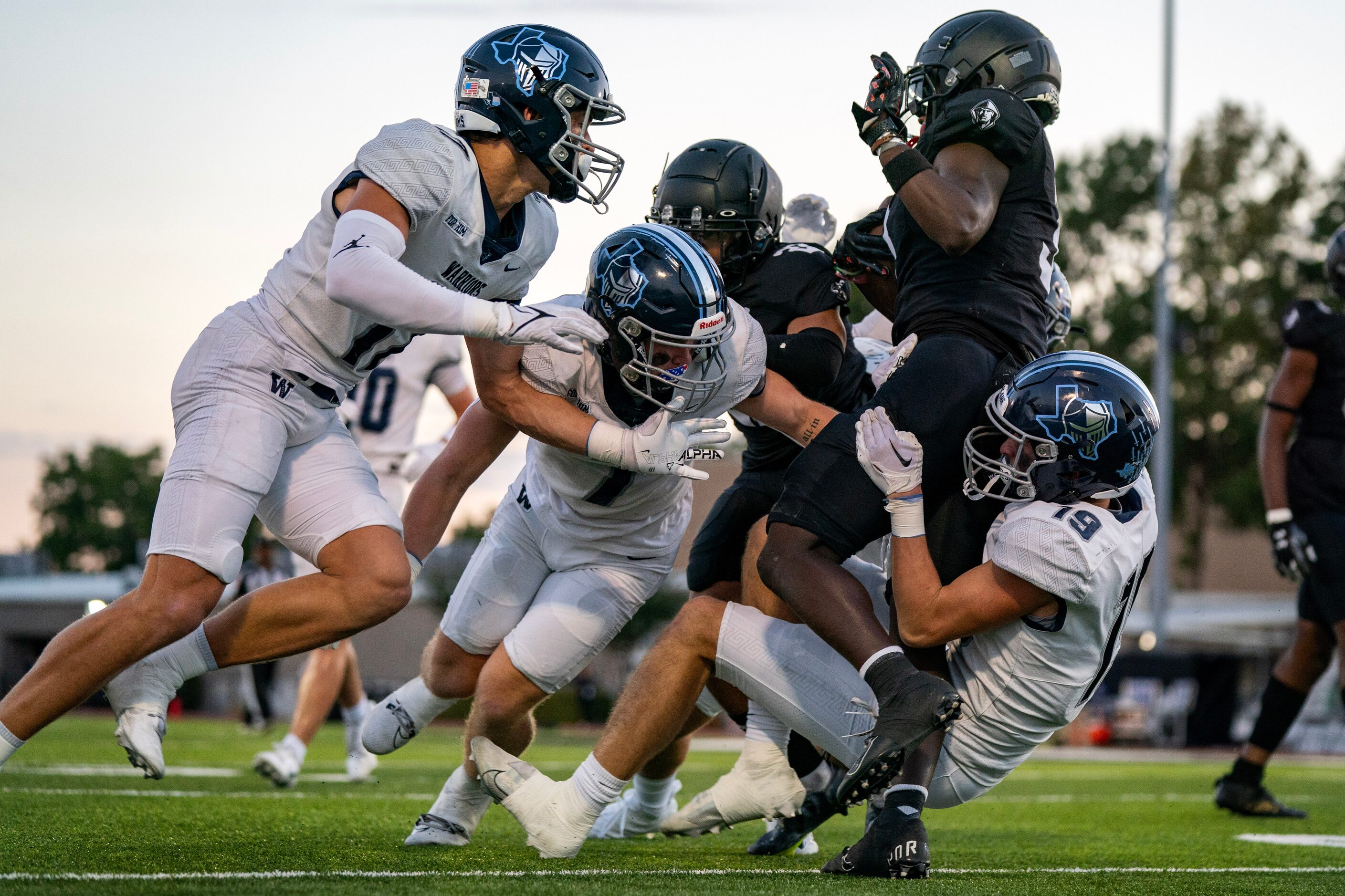 Argyle Liberty Christian freshman defensive back Cooper Witten, left, sophomore linebacker...