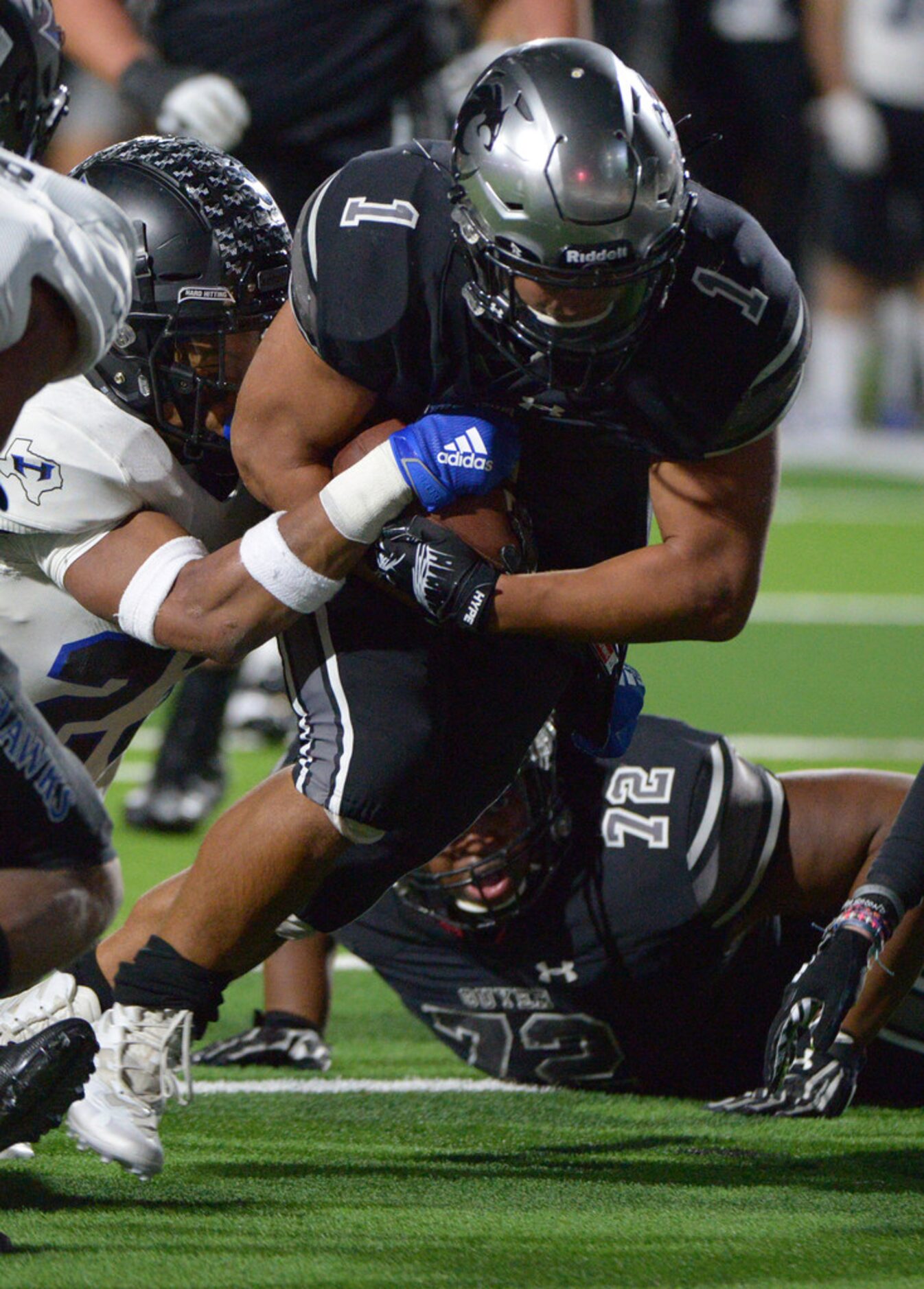 Guyer's Kaedric Cobbs runs for a touchdown in the first half of a Class 6A Division II...