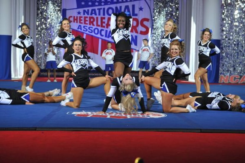 
Hebron’s competitive cheer team strikes a pose during one of its performances at National...