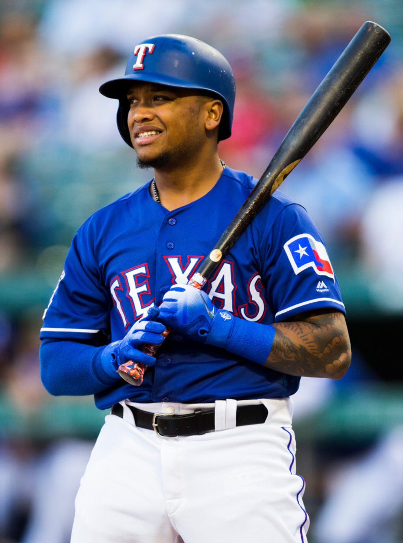 Texas Rangers left fielder Willie Calhoun (5) reacts to a strike during the second inning of...