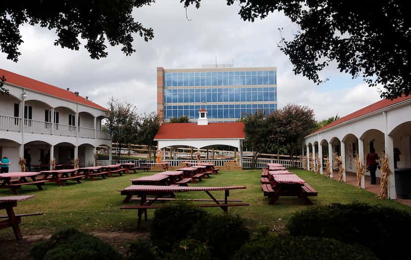 The old farm buildings are surrounded by office towers, neighborhoods and shopping centers....