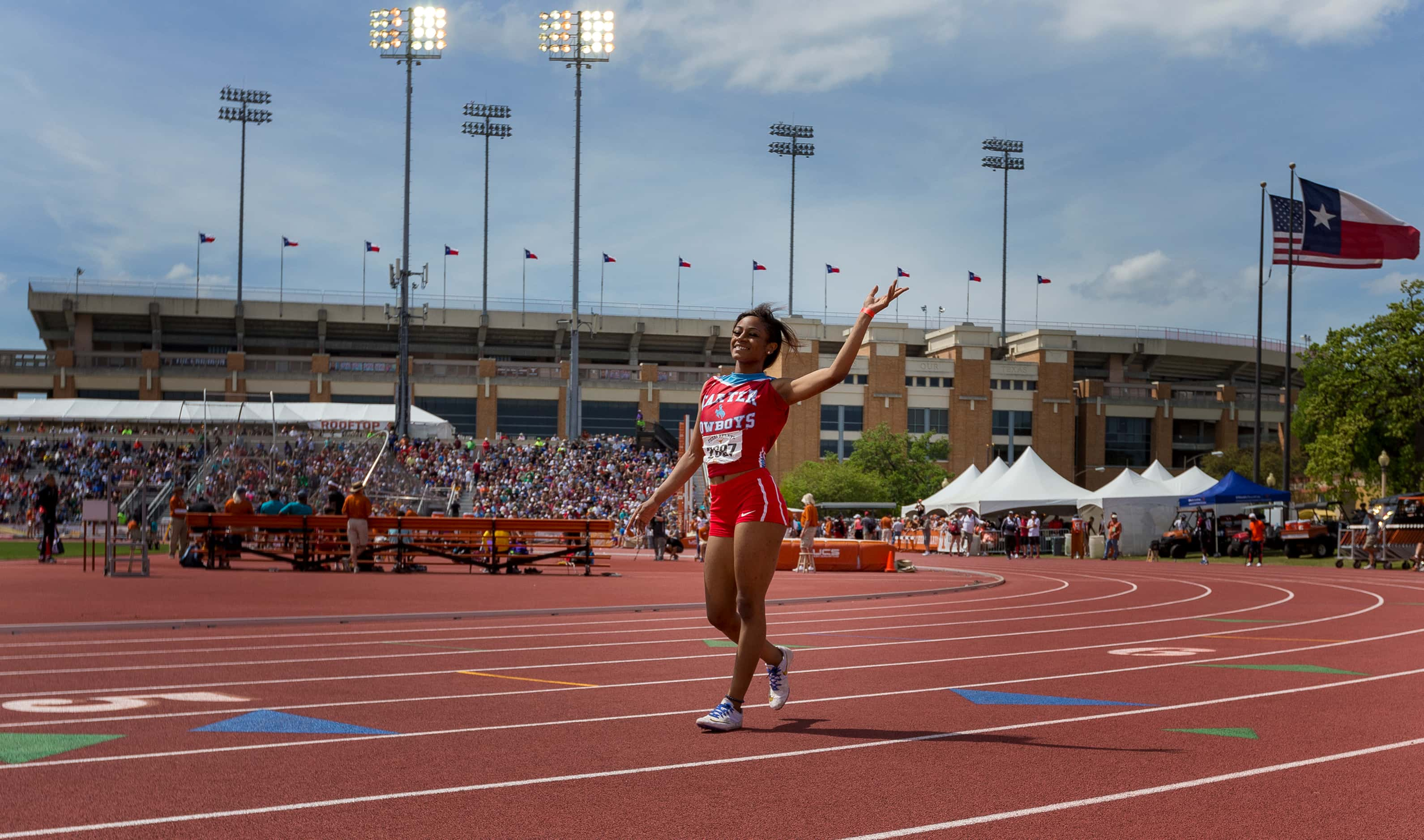 Dallas Carter's Sha'Carri Richardson (2697) celebrates finishing first in the girls Division...