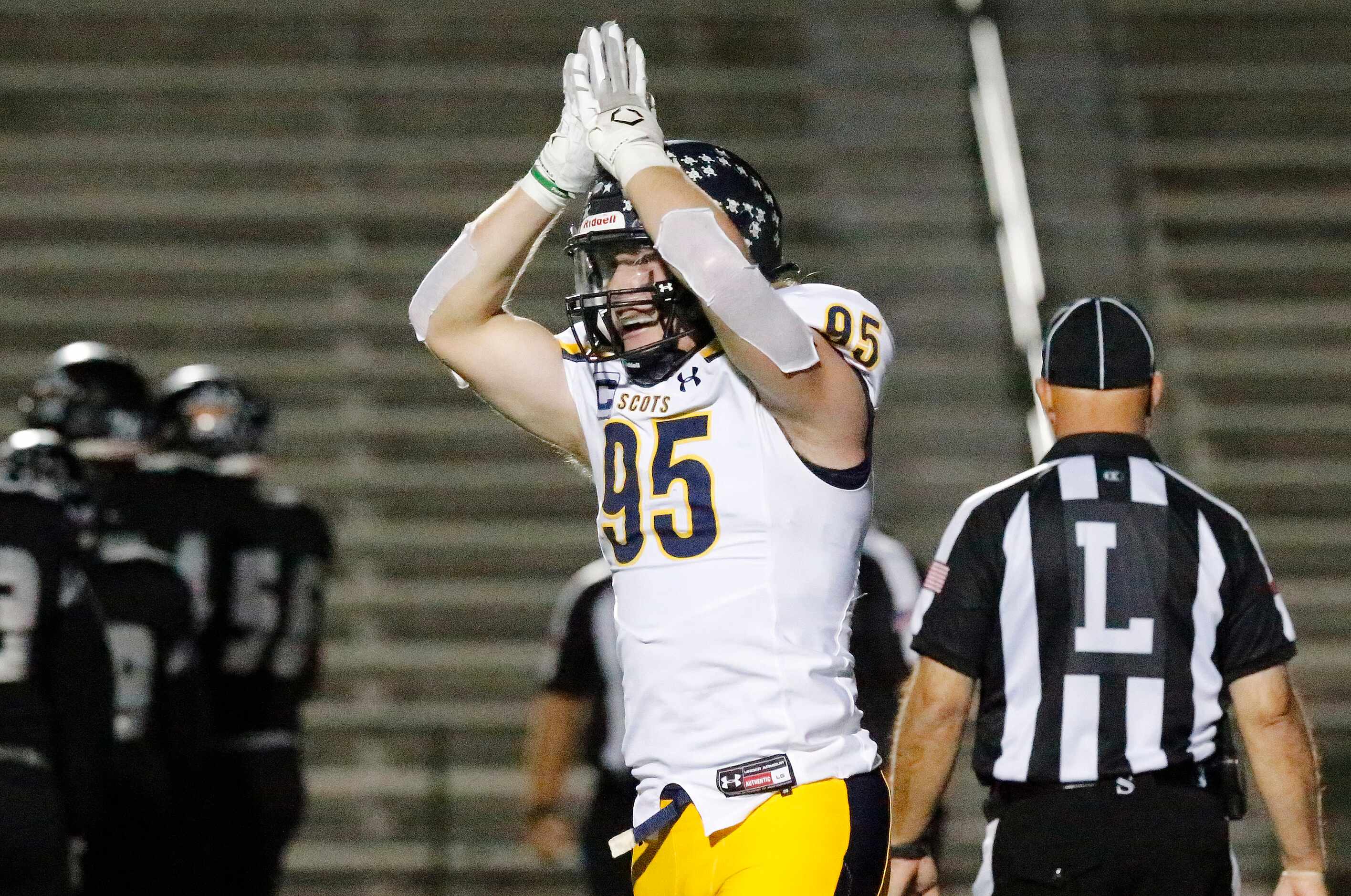 Highland Park High School Jack Curtis (95) celebrates the second safety of the first half as...