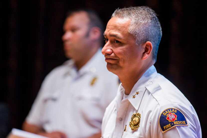 Deputy Fire Chief and Fire Marshal Christopher Martinez (right) and Lieutenant Dwight...