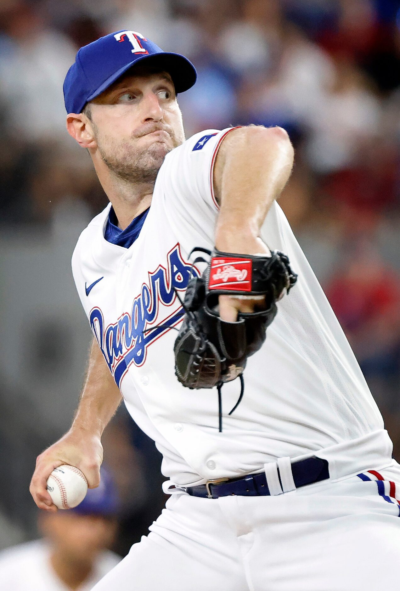 Texas Rangers starting pitcher Max Scherzer (31) throws against the Chicago White Sox during...