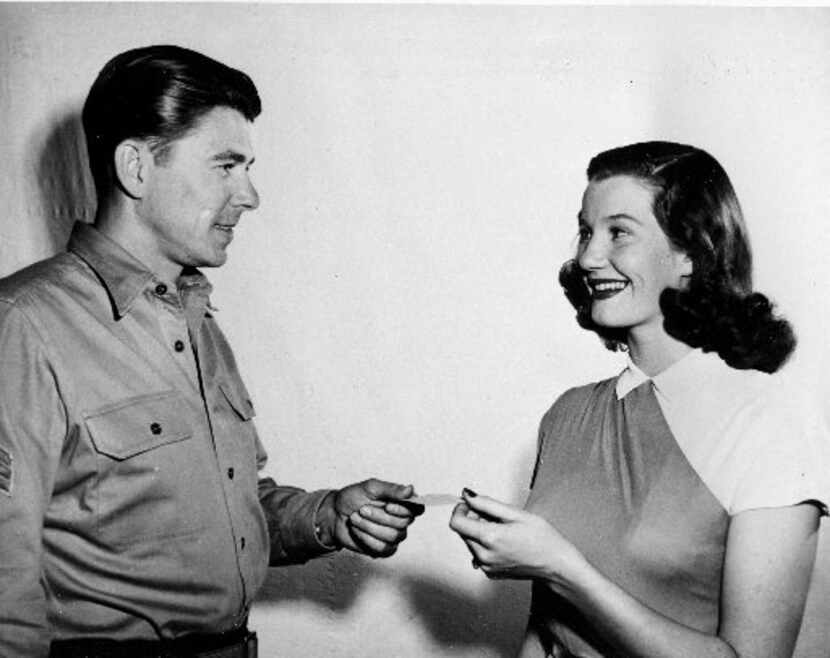 In this March 30, 1947 picture, Lois Maxwell, 20-year-old Canadian-born actress, receives...