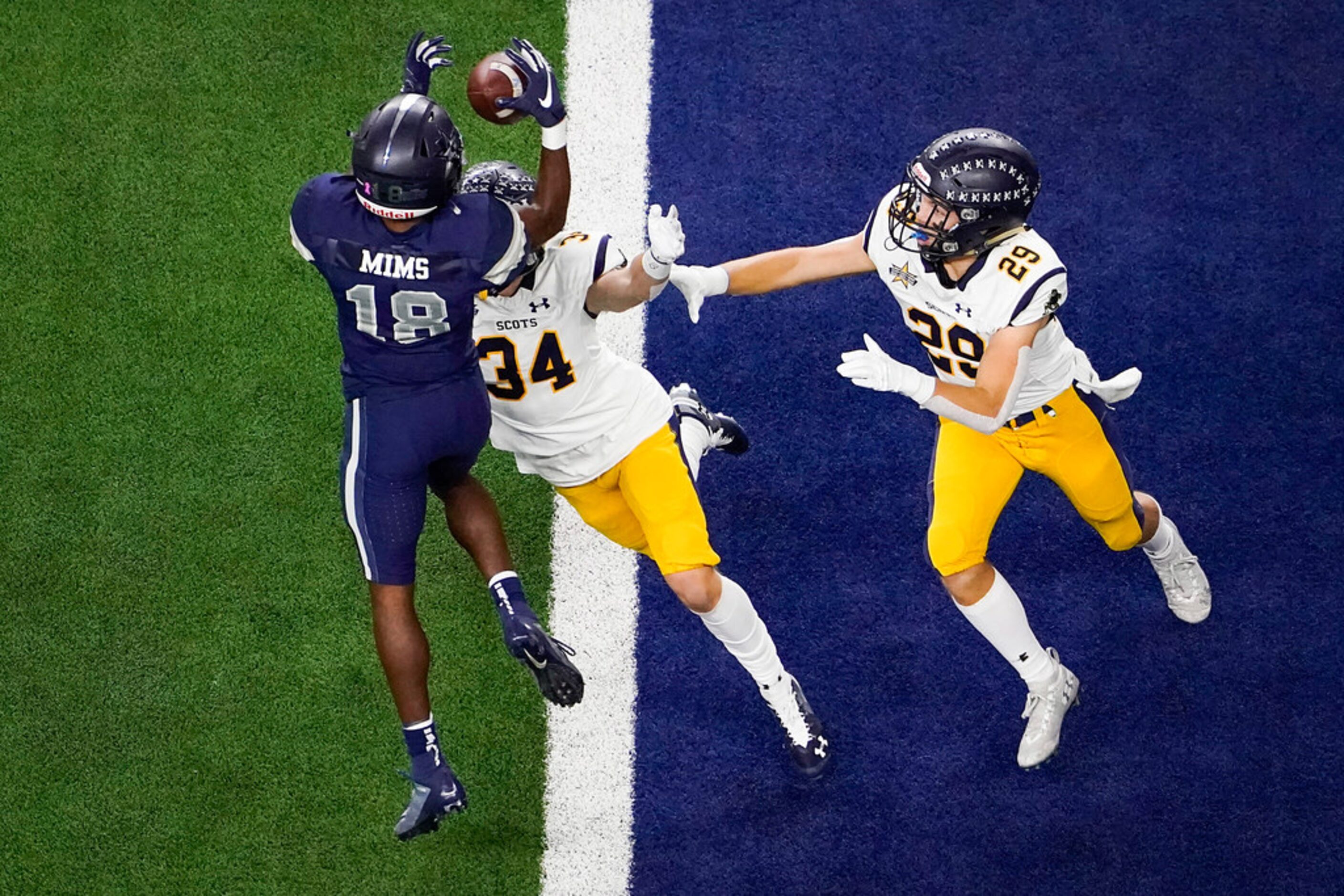 Frisco Lone Star wide receiver Marvin Mims catches a 11-yard touchdown pass from Garret...