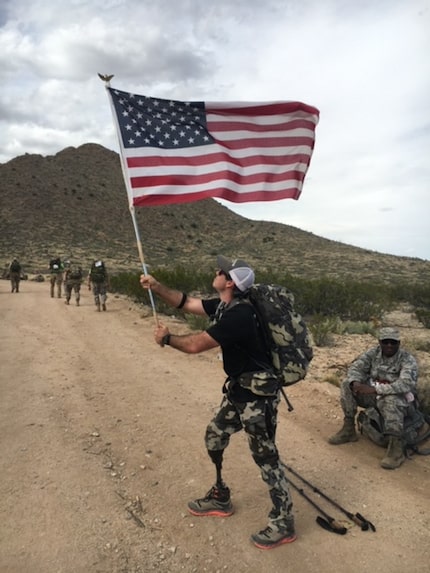 John Wayne Walding, a former Green Beret Special Forces soldier from Little Elm, waved the...