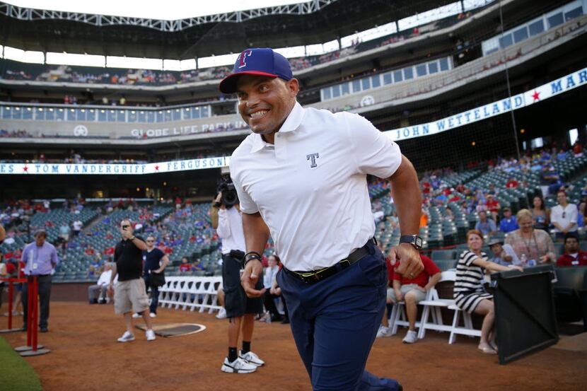 Former Texas Rangers player Ivan 'Pudge' Rodriguez  is introduced before the Texas Rangers...