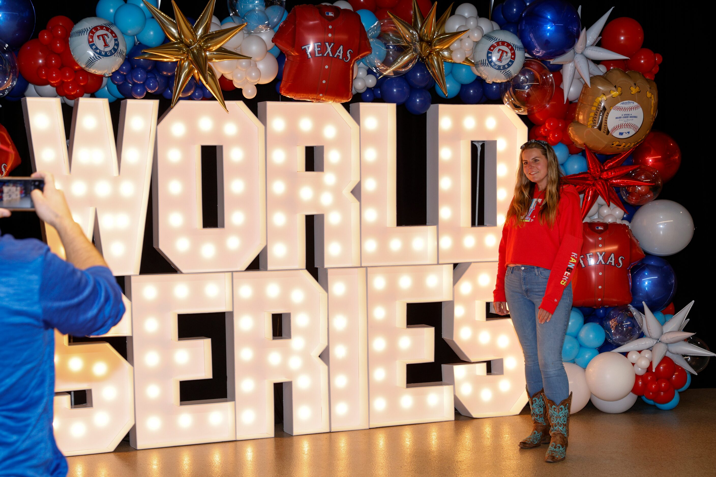 Amanda Reta of Wylie poses for a photo before Game 3 of the World Series at a watch party at...