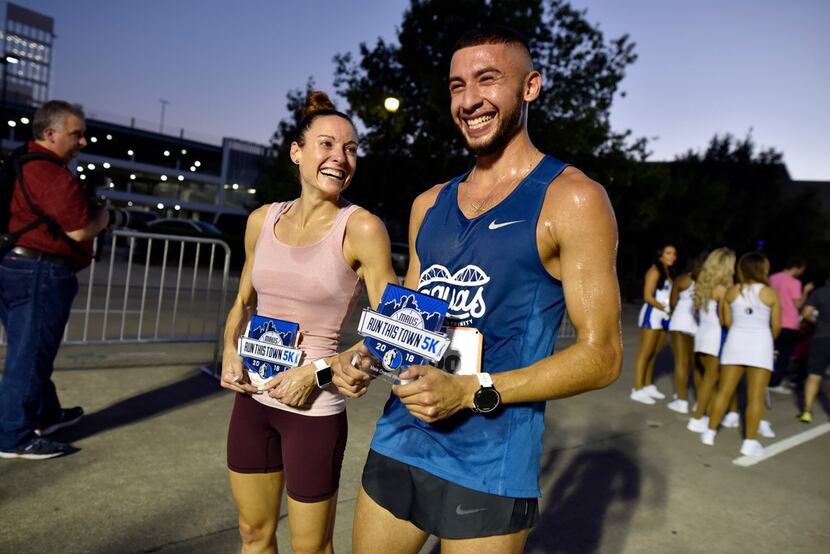 The first woman and man to finish the 2018 Mavs Run This Town 5k, Erica Marrari, of Dallas,...