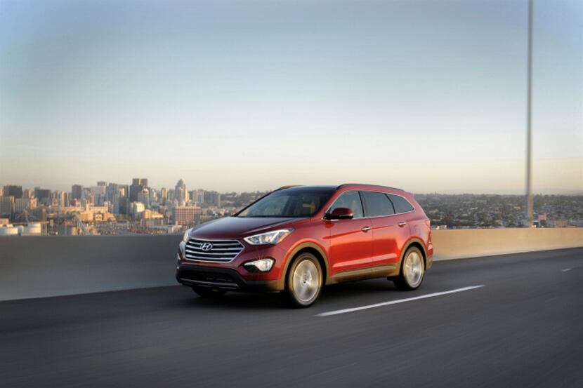 The 2013 Hyundai Santa Fe Limited has three rows of seats and 80 cubic feet of interior space.