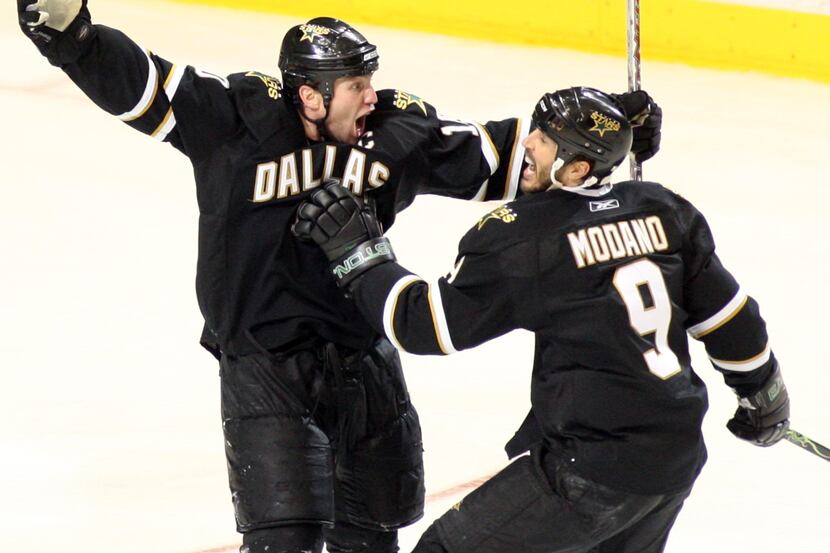 Brenden Morrow (left) celebrates one of the biggest goals of his career, a shot in the...