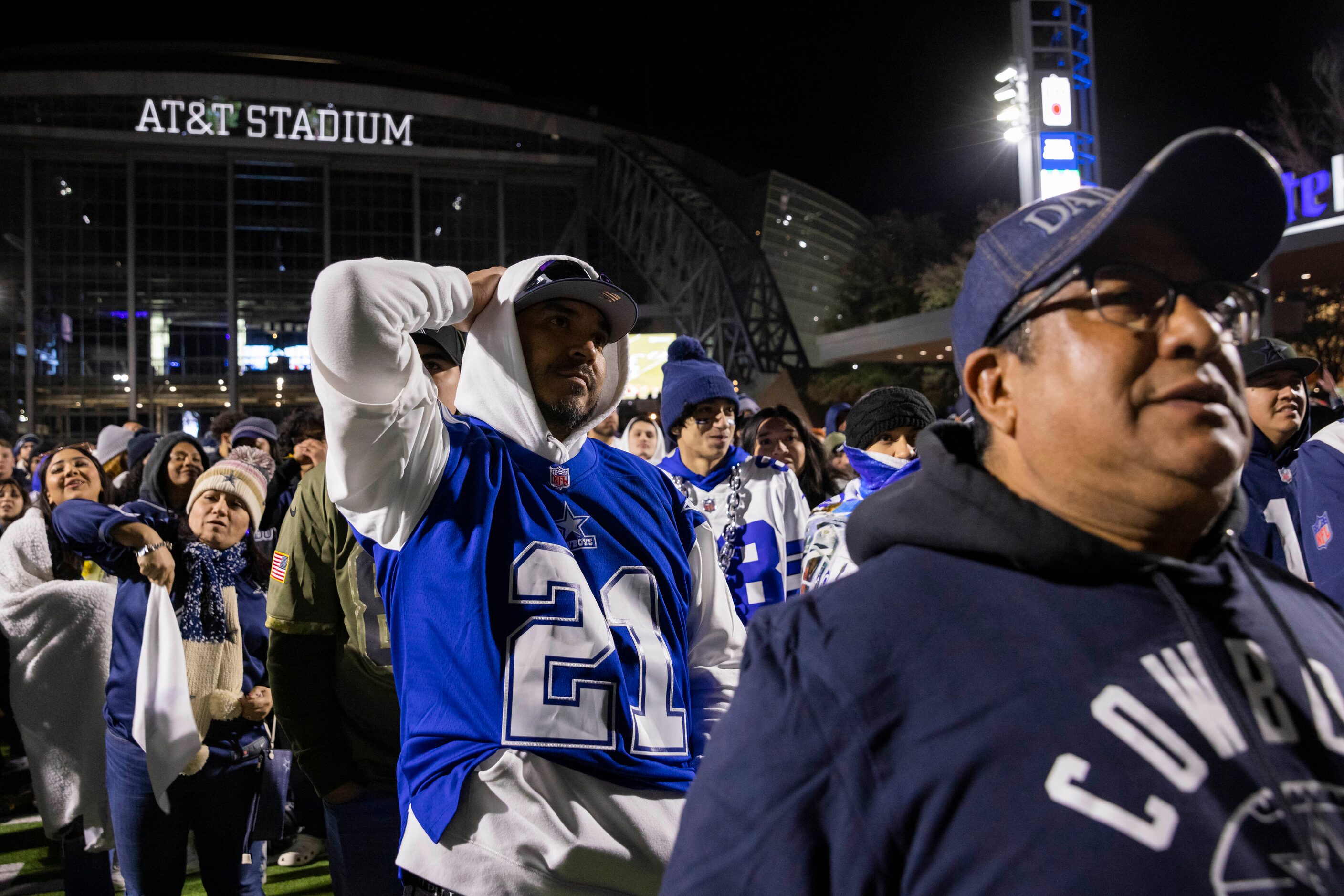 Dallas Cowboys fan Robert Torres of Houston puts his hand on his head as the Cowboys fail to...