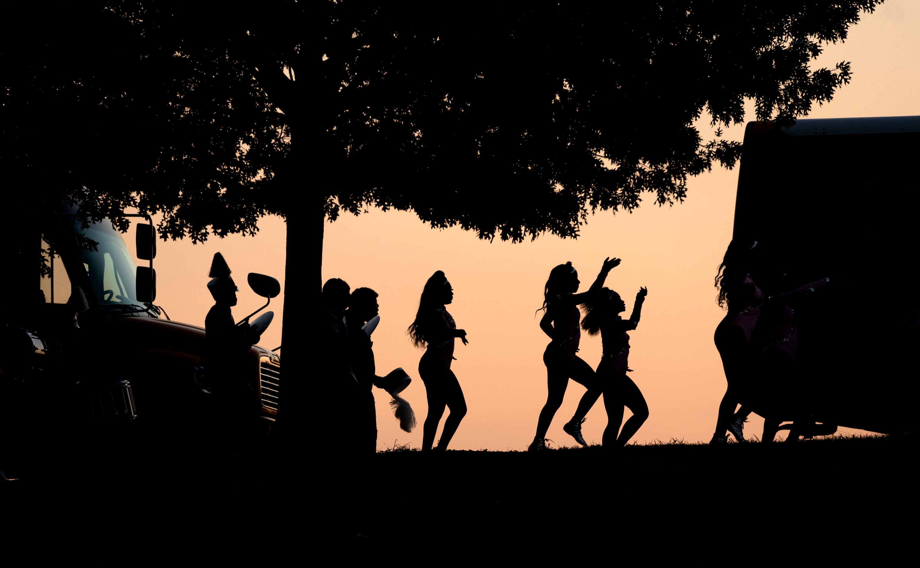 The Kimball drill team enters the stadium before a high school football game against South...