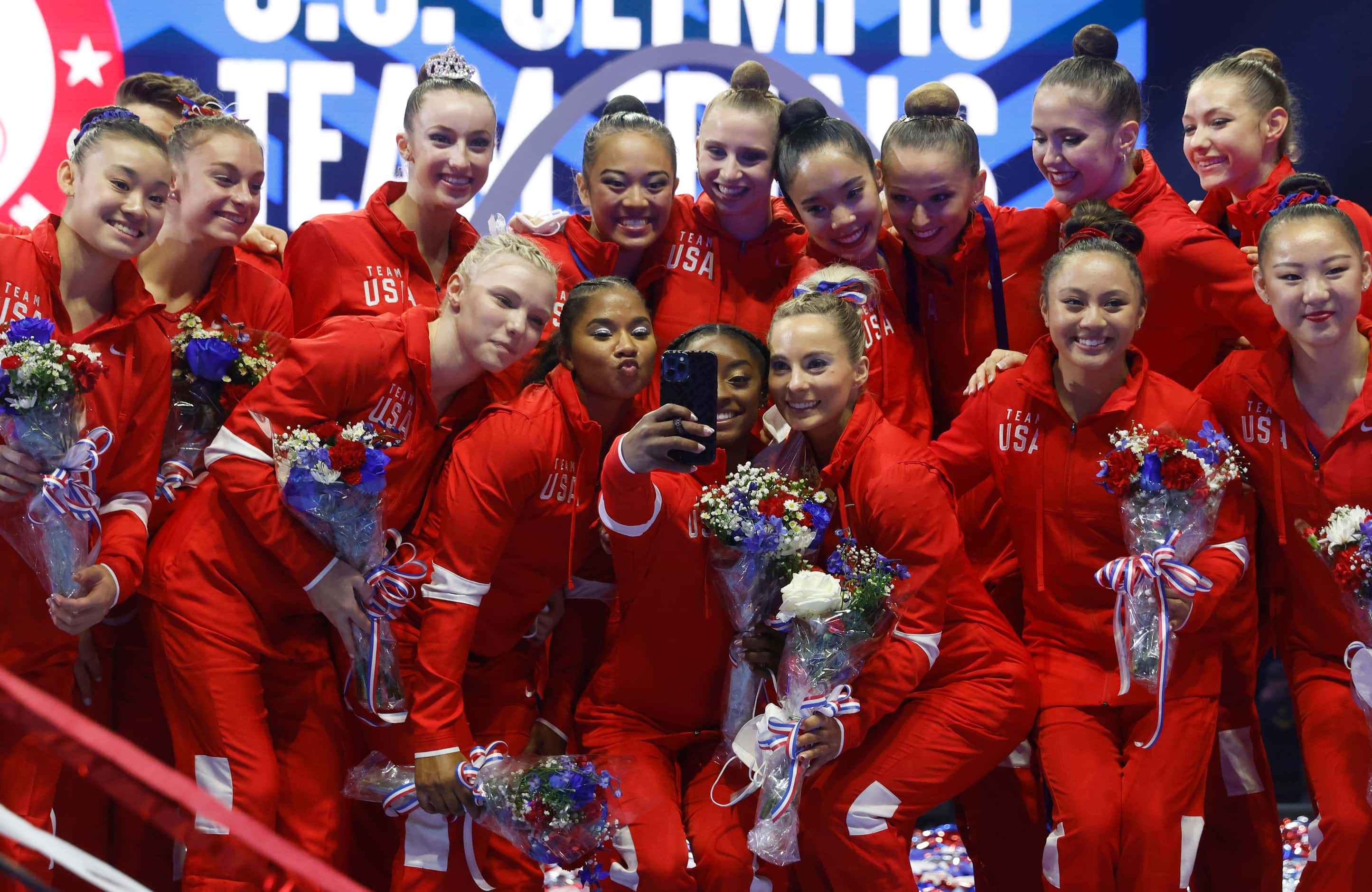 Simone Biles takes a selfie with teammates after the announcement of the U.S. Women's...