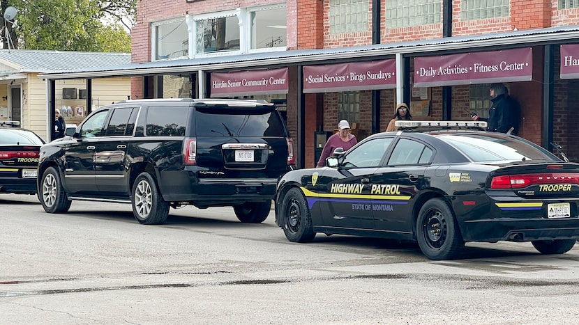 A car marked Montana Highway Patrol sits parked during filming on "Yellowstone."