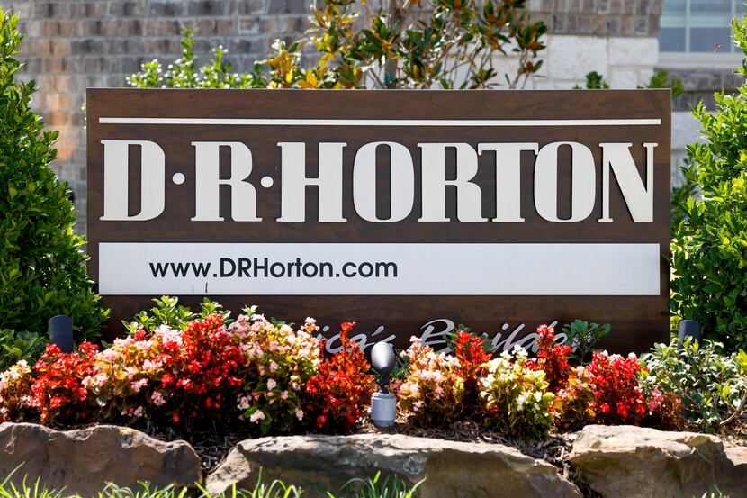 A sign for homebuilder D.R. Horton sits inside the Fireside by the Lake development along...