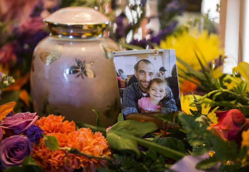 
A pink urn containing the remains of four-year-old Leiliana Rose Wright sat with a photo of...