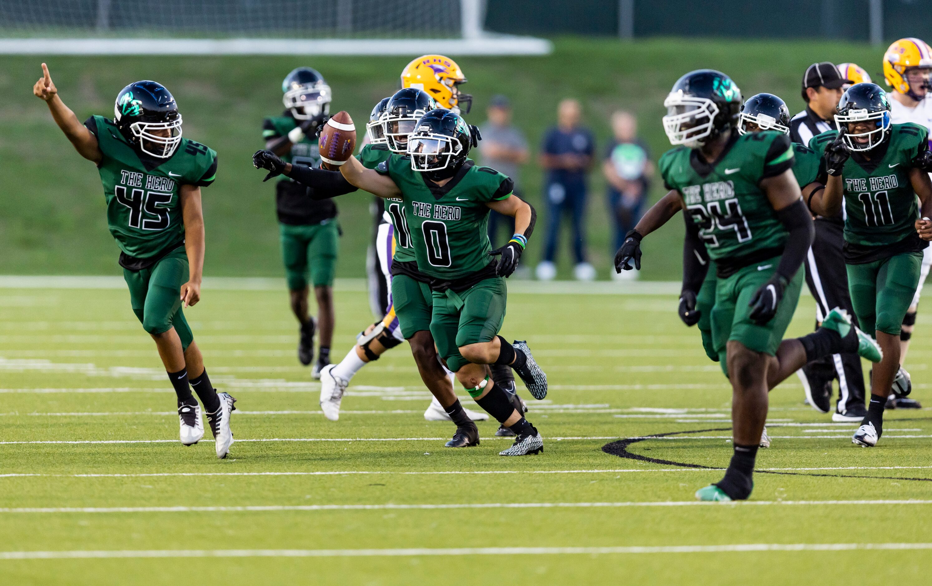 Berkner senior defensive lineman Laween Ahmed (0) celebrates recovering a Richardson fumble...