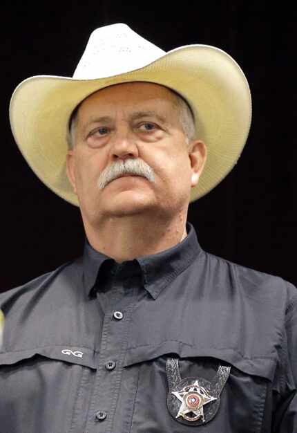 Waller County sheriff Glenn Smith listens to a speaker at a press conference Tuesday, July...