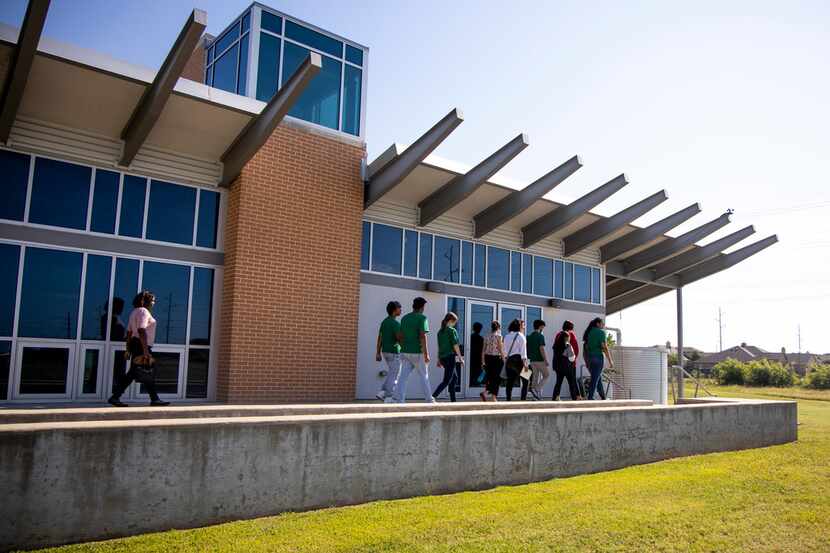 Students tour the University of North Texas Zero Energy Lab in Denton, Texas on Thursday,...