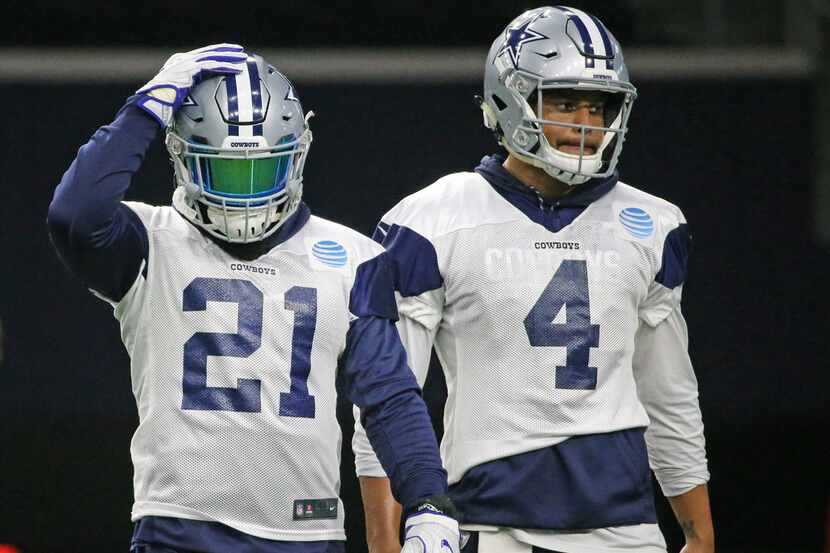 Dallas Cowboys running back Ezekiel Elliott (21) is back at practice with quarterback Dak...