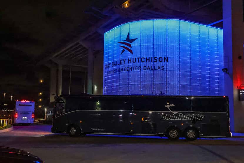 Four charter buses arrive at the Kay Bailey Hutchison Convention Center in Dallas on...