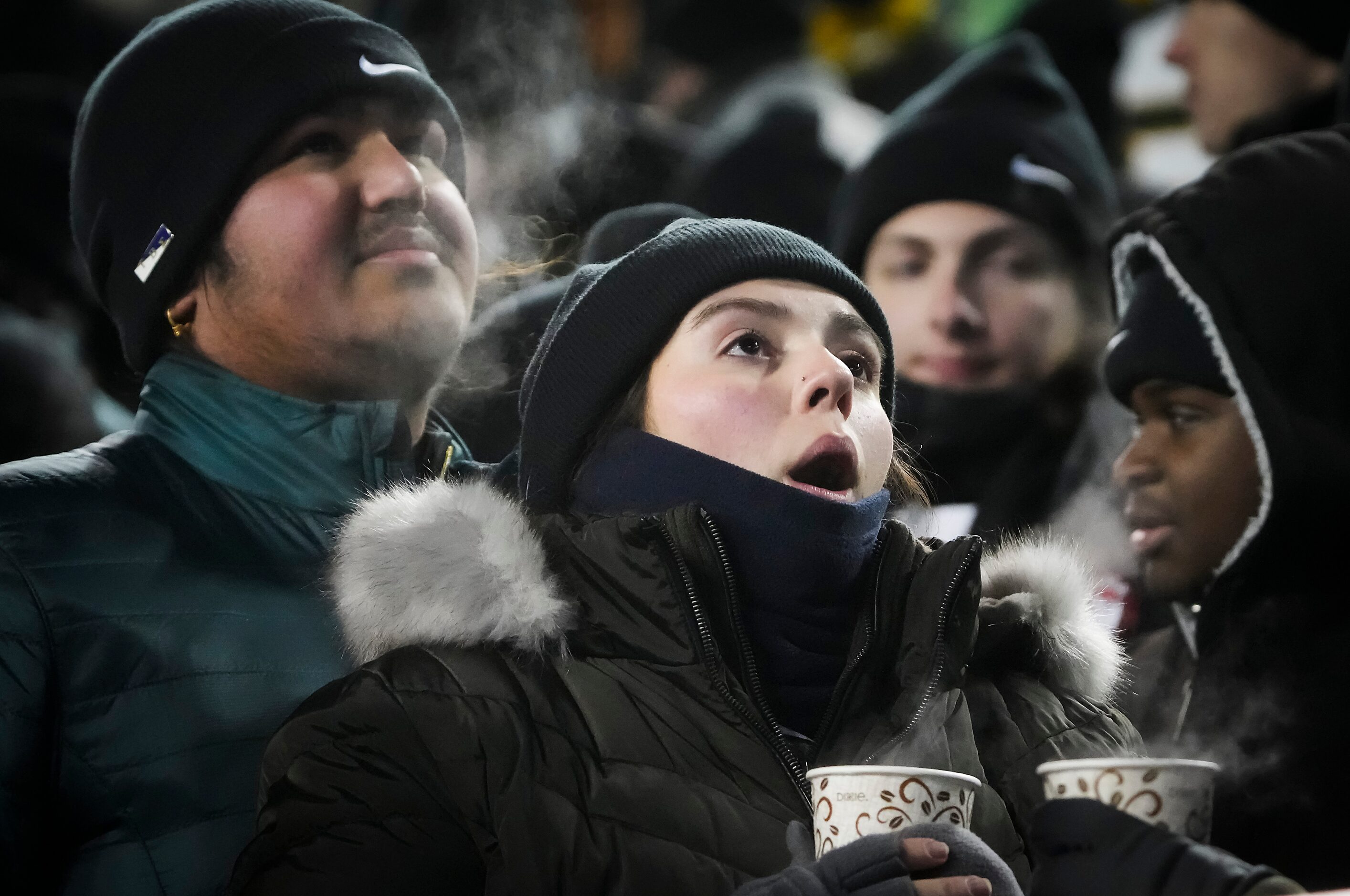 The Baylor band drinks hot beverages during the second half of the Armed Forces Bowl NCAA...