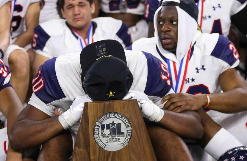 Denton Ryan reacts to losing a Class 5A Division I state championship game against Alvin...