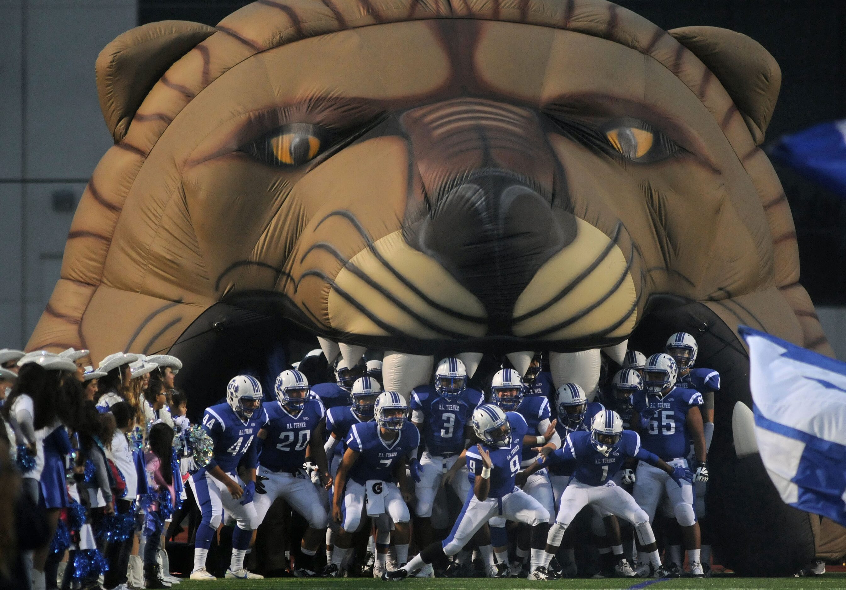 R.L. Turner players get fired up before a high school football game against Conrad at...