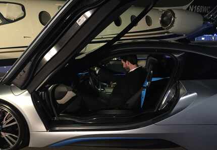 The BMW i8 sits so low, guests had to climb down to get behind the wheel.