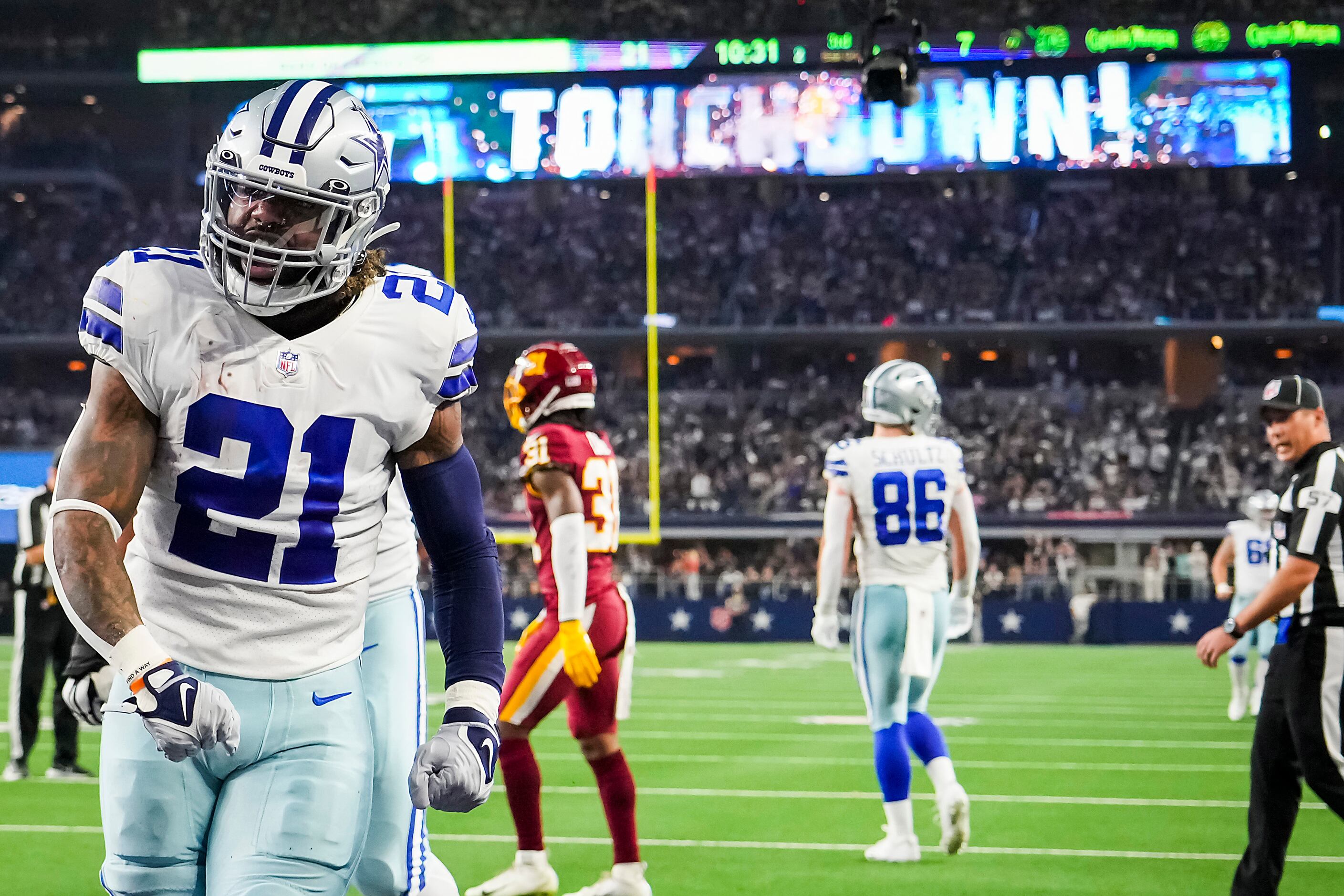 Photos: Tip toeing! Cowboys DE Demarcus Lawrence stays in bounds while  returning an interception for a touchdown