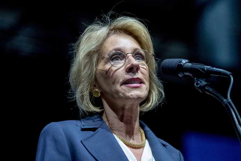 President-elect Donald Trump's pick for education secretary, Betsy DeVos, speaks during a...