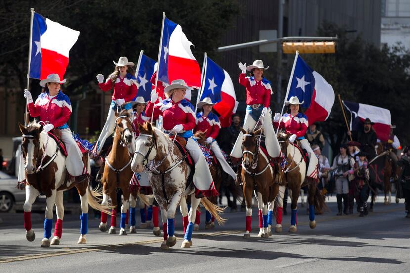 Daughters of the Republic of Texas ride along in the Texas Independence Day parade up...