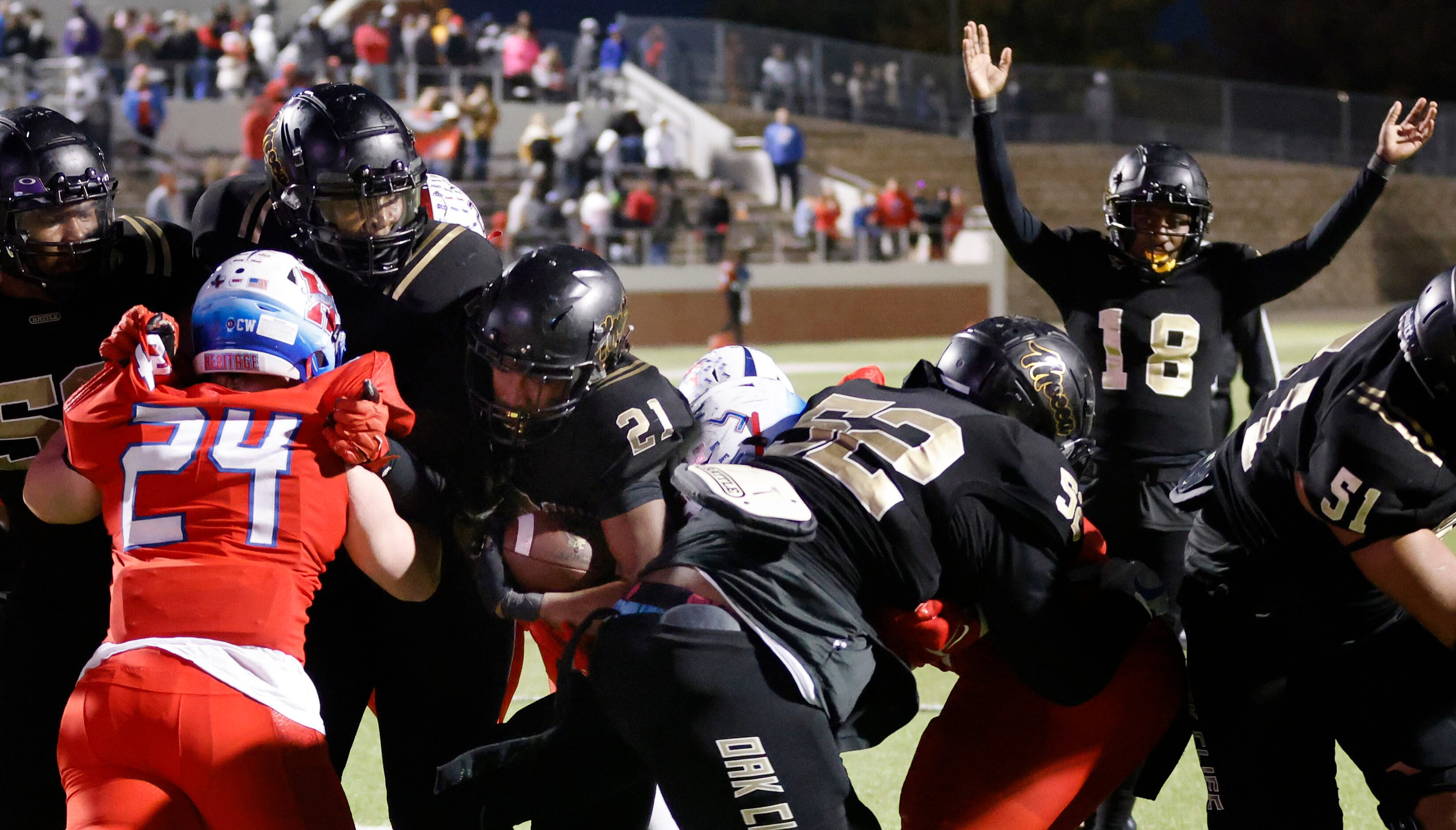 South Oak Cliff running back Danny Green (21) crosses the goal line for the winning...