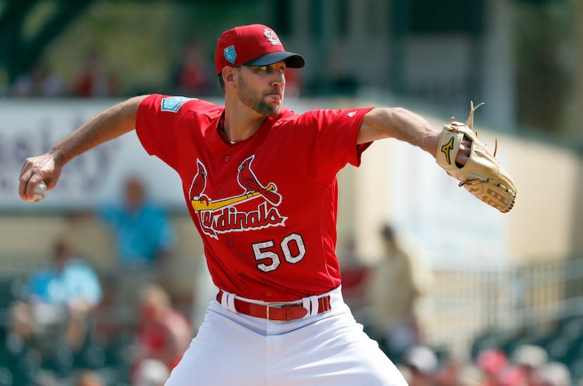 St. Louis Cardinals starting pitcher Adam Wainwright throws during the first inning of an...
