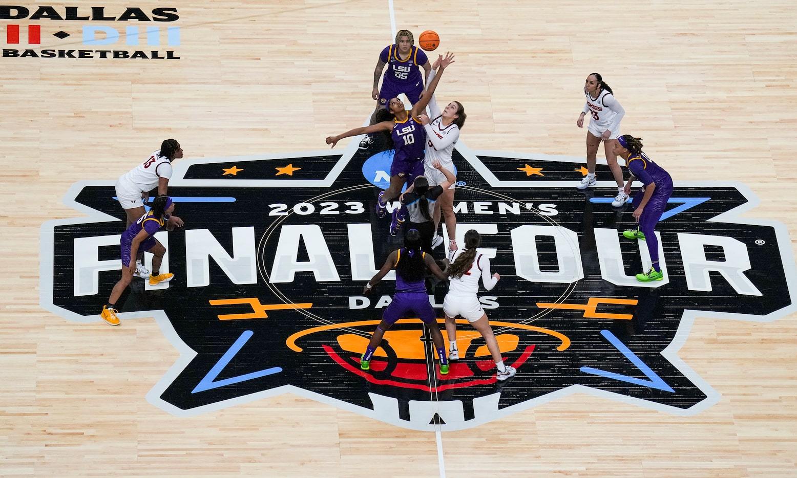 LSU forward Angel Reese (10) reaches for the opening tipoff against Virginia Tech center...